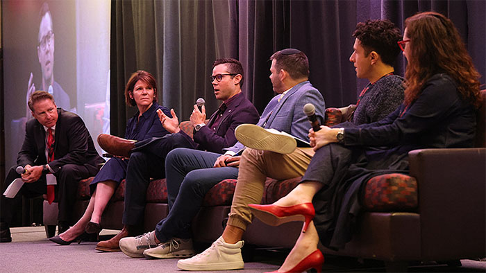 SDSU’s James Frazee hosted an industry panel at the Academic Applications of AI Summit. From left, Frazee, Valerie Singer (Amazon Web Services), Drew Sidel (Google), MJ Jabbour (Microsoft), Spencer Beemiller (ServiceNow) and Marta Rey Babarro (Zillow).